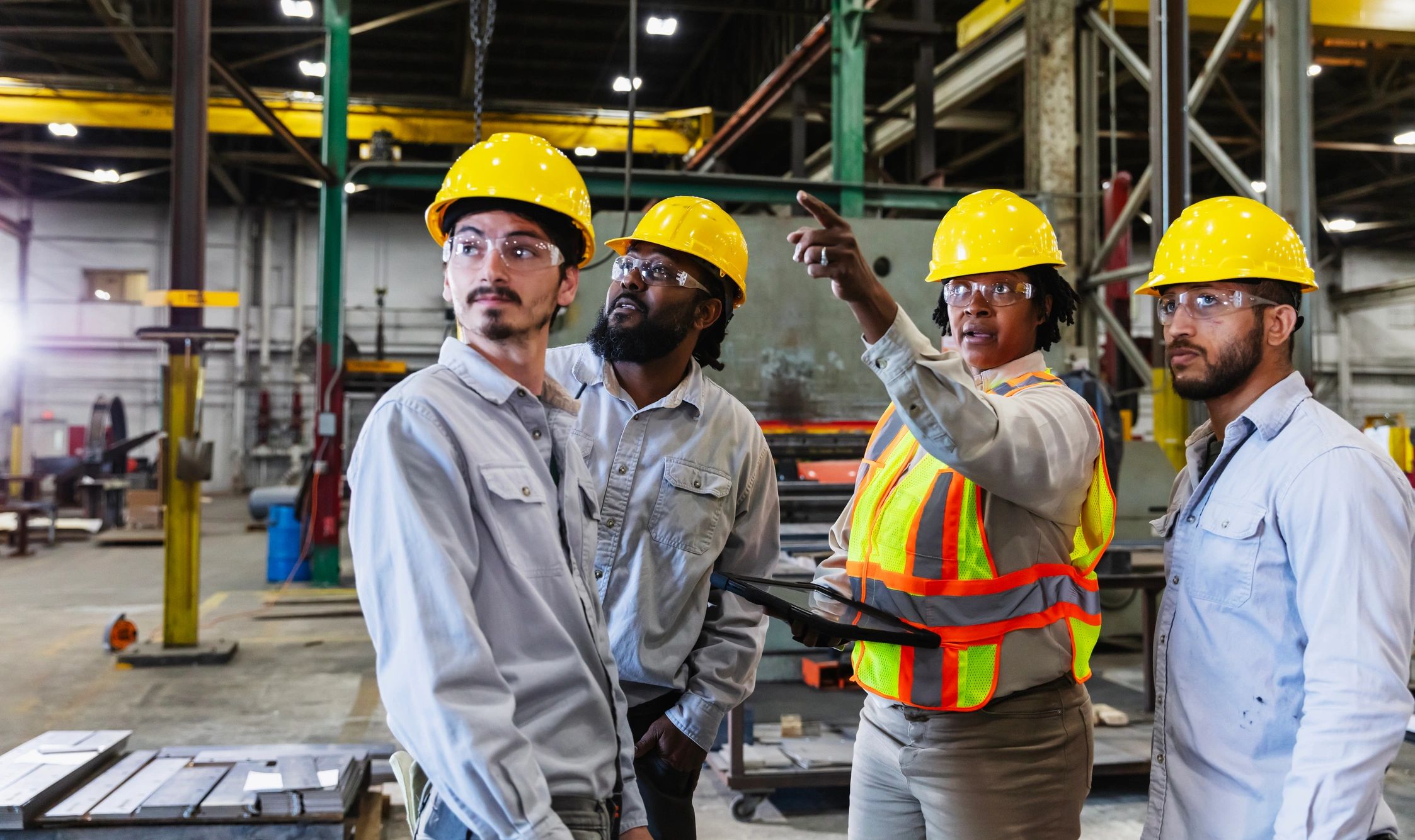 Factory team collaborating on industrial operations