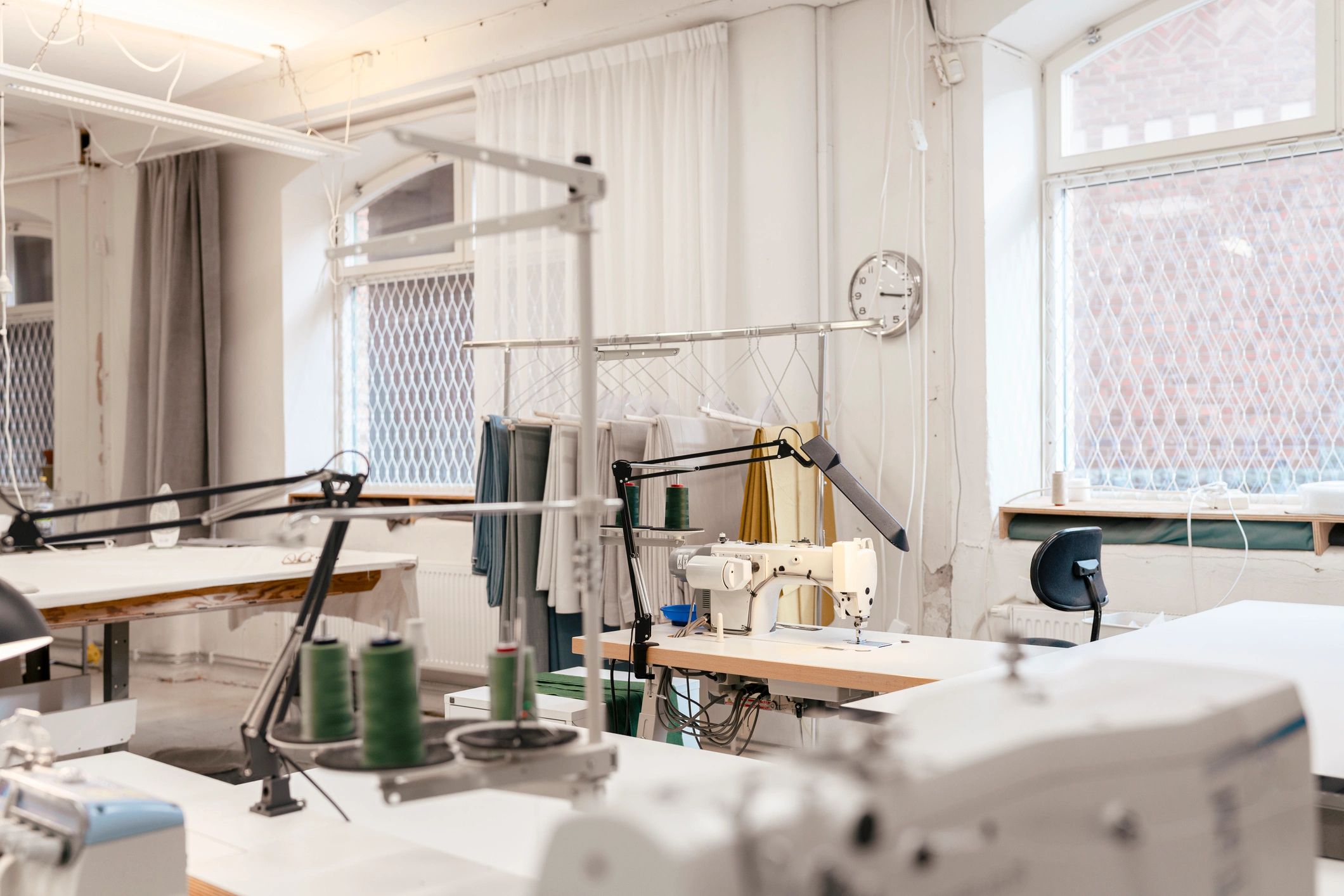 Industrial workshop with machinery and worktables